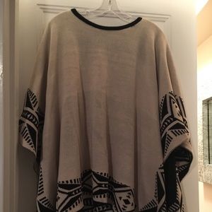 Never worn reversible poncho